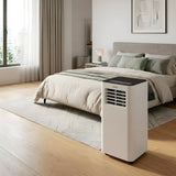 Aire acondicionado portátil Infiniton PACSF25A en un dormitorio luminoso