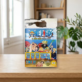 Panini Starter Pack One Piece - El nuevo mundo (004382SPEGGSS) sobre una mesa de madera