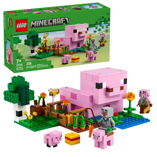 Packaging completo del LEGO Minecraft 21268 La Casa-Cerdo Bebé mostrando la caja y el modelo construido de 19 cm con casa en forma de cerdo, huerto con cultivos de patatas y remolachas, 5 figuras (héroe lobo, cerdo bebé, cerdo adulto, abeja, Piglin Zombi). Set de 238 piezas del bioma Bosque para niños a partir de 7 años con garantía de 3 años.
