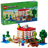 Vista frontal del set LEGO Minecraft 21275 con casa TNT, Steve, zombis y bote en la selva