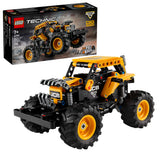 LEGO Technic Monster Jam DIGatron 42199 - Vista frontal del camión monstruo con pala excavadora amarilla y neumáticos gigantes sobre fondo blanco
