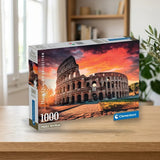Puzzle 1000 Clementoni Roman Sunset (39985) sobre una mesa de madera