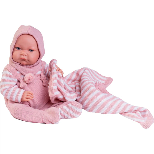 Muñeca Antonio Juan Recién Nacida Nica 42cm con cuerpo de tela suave, rostro de vinilo realista, conjunto de punto con rayas, gorro y toquilla, extremidades rotatorias para máximo realismo
