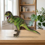 Toy Planet Dino Blandito con sonidos (53537) sobre una mesa de madera