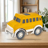 Toy Planet Eco Bus Escolar (03396M) sobre una mesa de madera