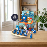 Infographic: Toy Planet Dental Clinic case open with its 43 toy dentist pieces on a wooden table