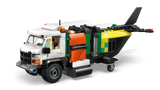 Camión LEGO técnico blanco con plataforma elevadora y avión sanitario amarillo
