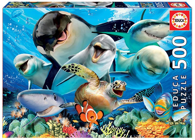 A Educa Borrás - Puzzle 500 Piezas Selfie bajo el agua (17647) protagonizado por un grupo de delfines y tiburones, perfecto para amantes de los rompecabezas y amantes del océano.