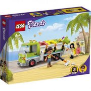 Vista frontal del camión LEGO Friends 41712 recogiendo contenedores de reciclaje